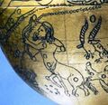 Mainz globe n.b. – facing away, walks to left, one leg raised, bow drawn